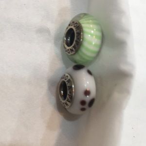 Two “pandora” beads